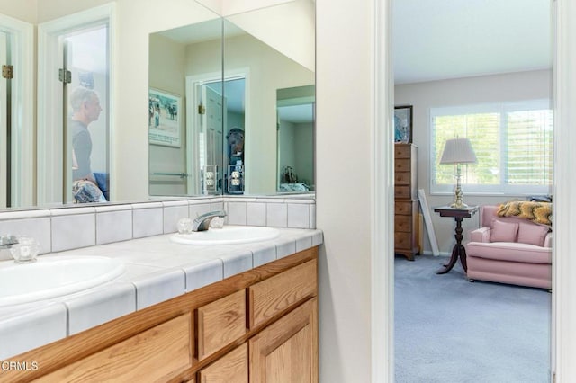 11616 E Las Posas Rd, Camarillo, CA 93012 - ensuite bathroom featuring double vanity and baseboards