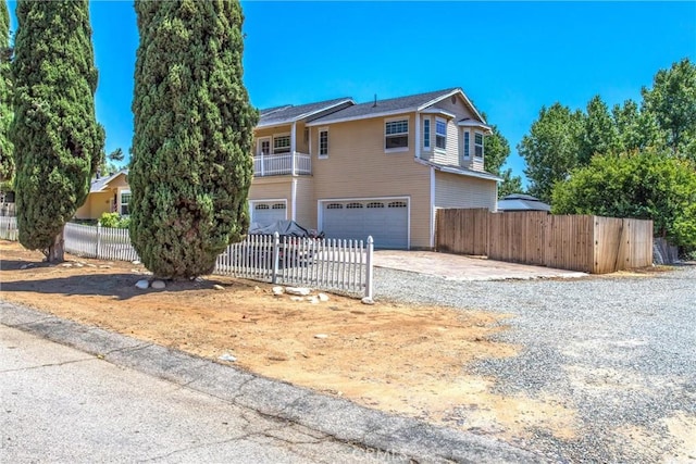 375 E County Line Rd, Calimesa, CA 92320 - view of front of house featuring a garage and driveway