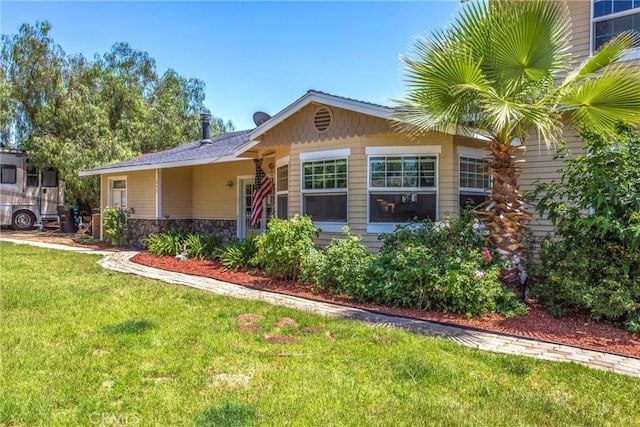 375 E County Line Rd, Calimesa, CA 92320 - view of front of home with a front lawn and stone siding