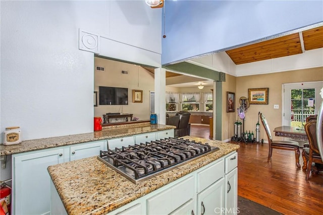 375 E County Line Rd, Calimesa, CA 92320 - kitchen featuring a ceiling fan, stainless steel gas cooktop, dark wood finished floors, light stone countertops, and lofted ceiling