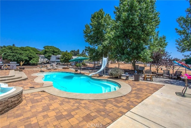 375 E County Line Rd, Calimesa, CA 92320 - outdoor pool featuring a water slide and a patio