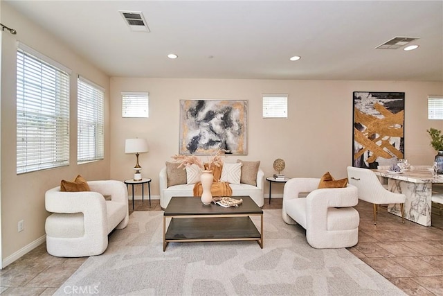 2910 E Via Terrano, Ontario, CA 91764 - living area featuring healthy amount of natural light, baseboards, and recessed lighting