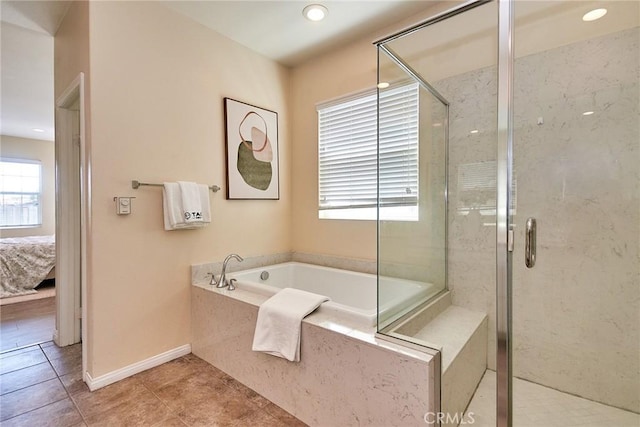 2910 E Via Terrano, Ontario, CA 91764 - ensuite bathroom with plenty of natural light, tile patterned floors, a shower stall, and recessed lighting