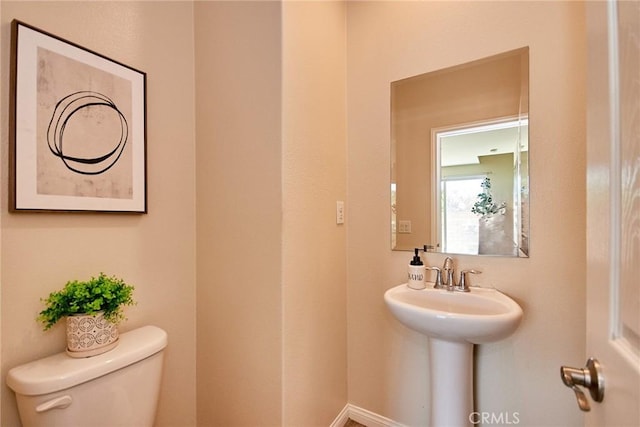 2910 E Via Terrano, Ontario, CA 91764 - bathroom featuring toilet and baseboards
