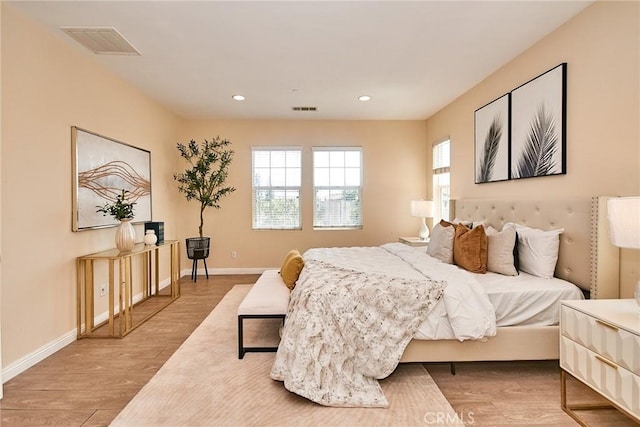 2910 E Via Terrano, Ontario, CA 91764 - bedroom with wood finished floors, baseboards, and recessed lighting