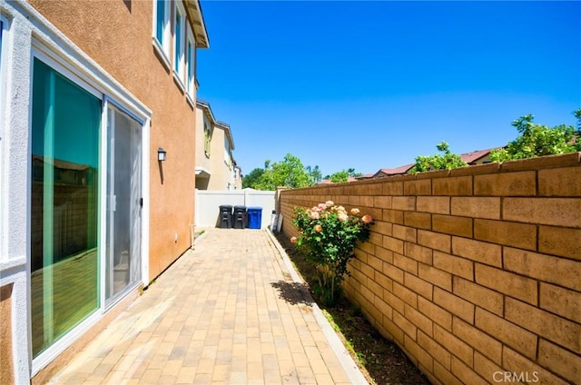 2910 E Via Terrano, Ontario, CA 91764 - view of patio / terrace with a fenced backyard