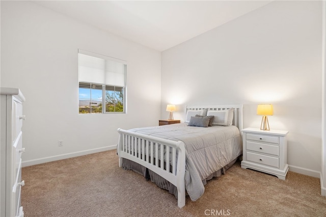 27 Medoc, Rancho Mirage, CA 92270 - bedroom featuring baseboards and light carpet