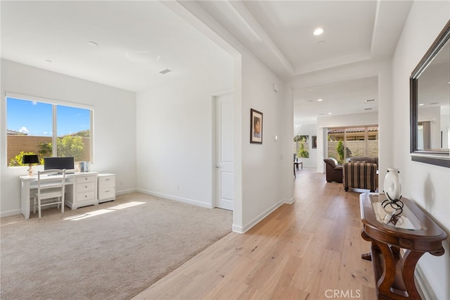 27 Medoc, Rancho Mirage, CA 92270 - corridor with light wood finished floors, baseboards, a desk, and recessed lighting