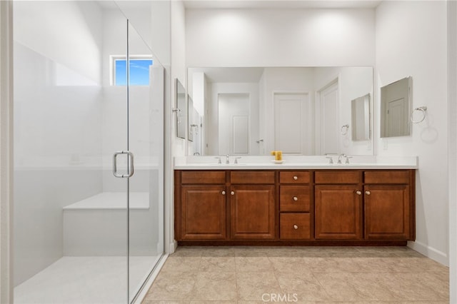 27 Medoc, Rancho Mirage, CA 92270 - full bath with a stall shower, double vanity, and baseboards