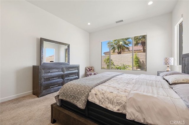 27 Medoc, Rancho Mirage, CA 92270 - bedroom featuring light carpet, multiple windows, baseboards, and recessed lighting