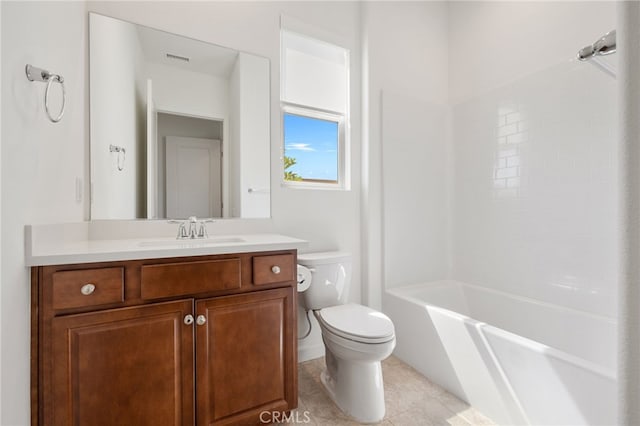 27 Medoc, Rancho Mirage, CA 92270 - bathroom with toilet, vanity, tile patterned flooring, and bathtub / shower combination