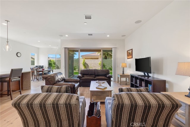 27 Medoc, Rancho Mirage, CA 92270 - living area featuring light wood-style floors and recessed lighting