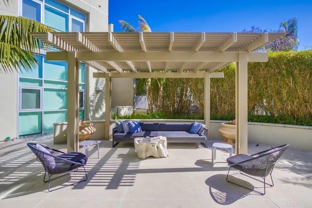 view of patio / terrace with an outdoor hangout area and a pergola