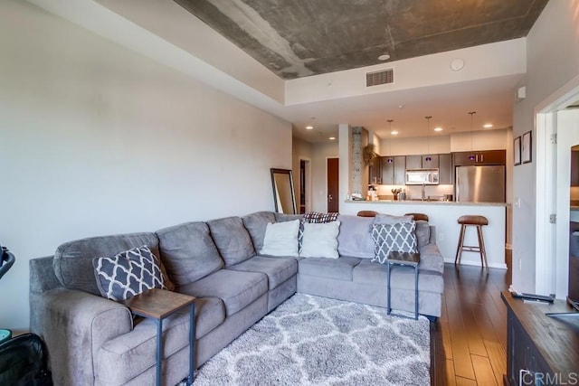 living area featuring hardwood / wood-style floors