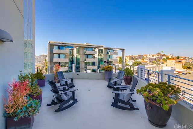 view of patio with a balcony