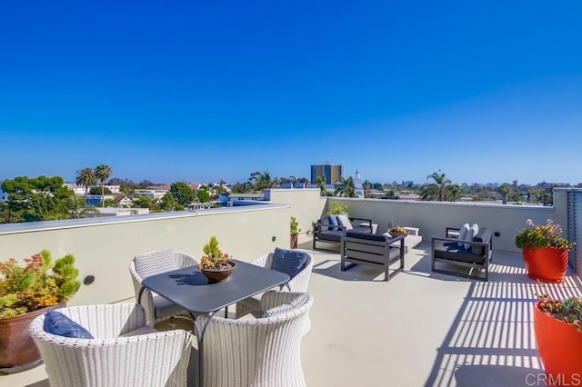 view of patio featuring outdoor lounge area and outdoor dining space