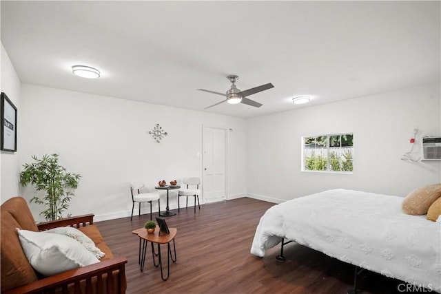 5616 Buffalo Ave, Valley Glen, CA 91401 - bedroom featuring dark wood-style flooring, a ceiling fan, and a wall unit AC