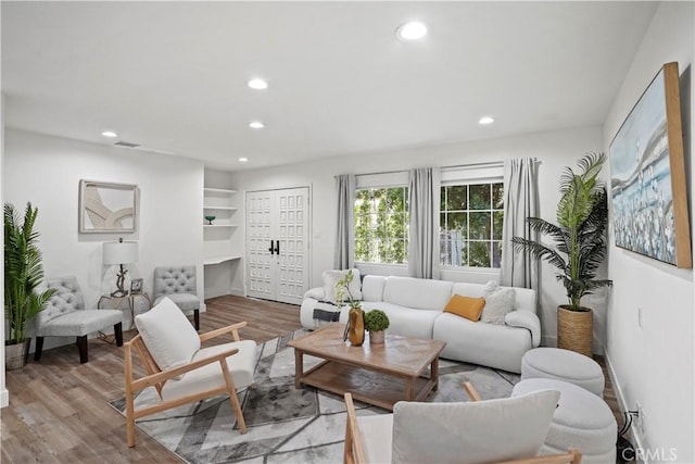 5616 Buffalo Ave, Valley Glen, CA 91401 - living room with recessed lighting and wood finished floors