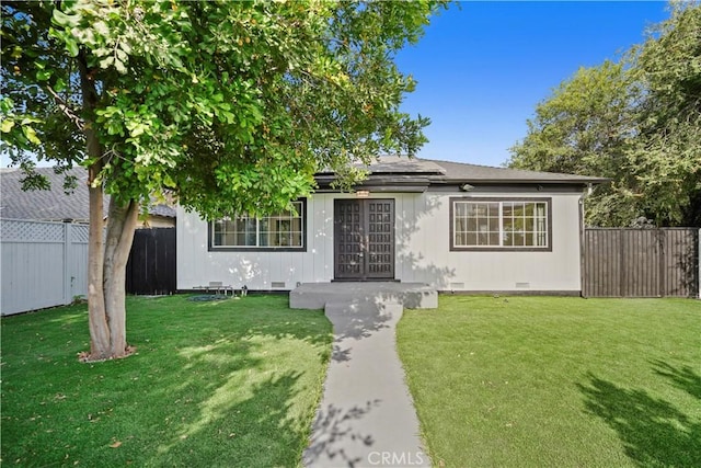 5616 Buffalo Ave, Valley Glen, CA 91401 - view of front of house featuring crawl space, french doors, and solar panels