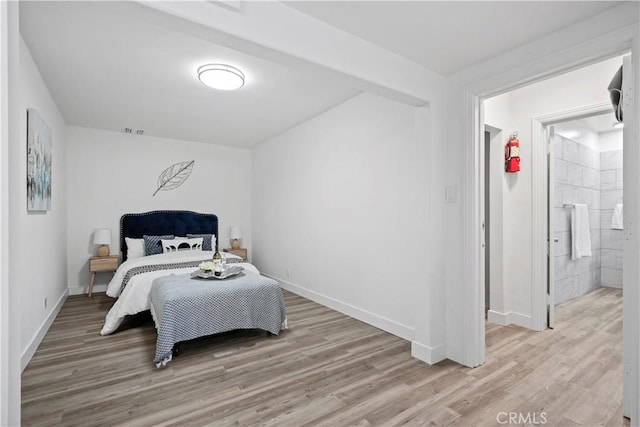 5616 Buffalo Ave, Valley Glen, CA 91401 - bedroom featuring light wood-style floors