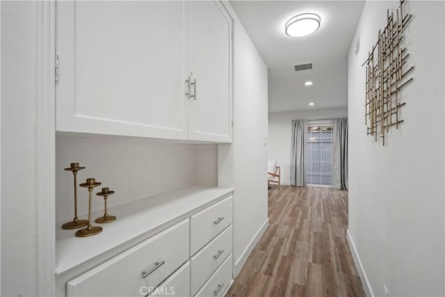 5616 Buffalo Ave, Valley Glen, CA 91401 - corridor featuring light wood-style flooring and recessed lighting