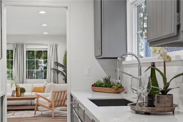 5616 Buffalo Ave, Valley Glen, CA 91401 - kitchen with gray cabinets, plenty of natural light, light countertops, and recessed lighting