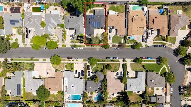 6454 Baird Ave, Reseda, CA 91335 - aerial perspective of suburban area featuring a pool and property parcel outlined