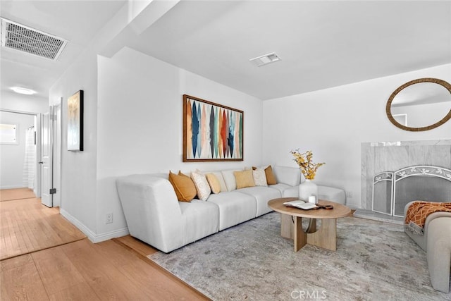 6454 Baird Ave, Reseda, CA 91335 - living area featuring wood-type flooring and baseboards