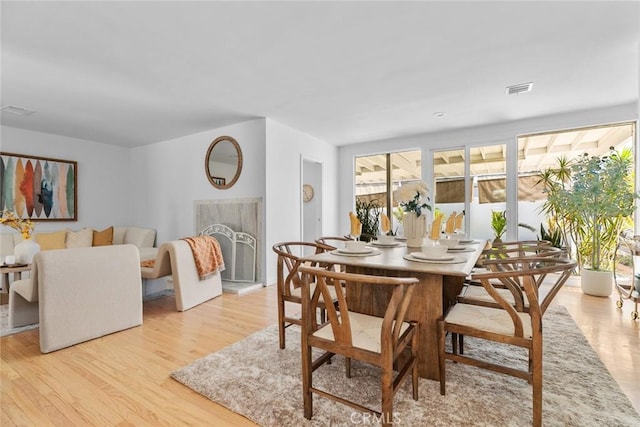 6454 Baird Ave, Reseda, CA 91335 - dining area with light wood finished floors