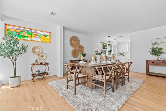 6454 Baird Ave, Reseda, CA 91335 - dining area featuring light wood-style flooring and baseboards