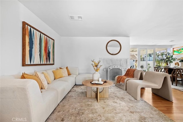 6454 Baird Ave, Reseda, CA 91335 - living room with wood finished floors and a fireplace