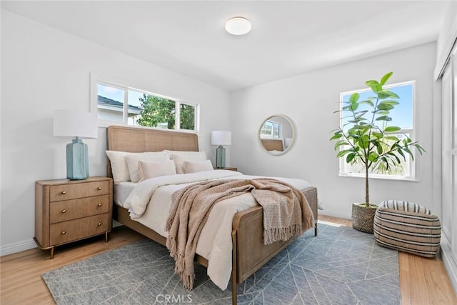 6454 Baird Ave, Reseda, CA 91335 - bedroom featuring wood finished floors and baseboards