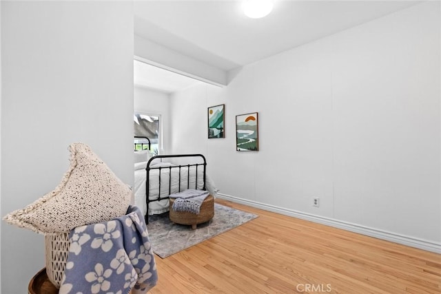 6454 Baird Ave, Reseda, CA 91335 - sitting room featuring wood finished floors and baseboards