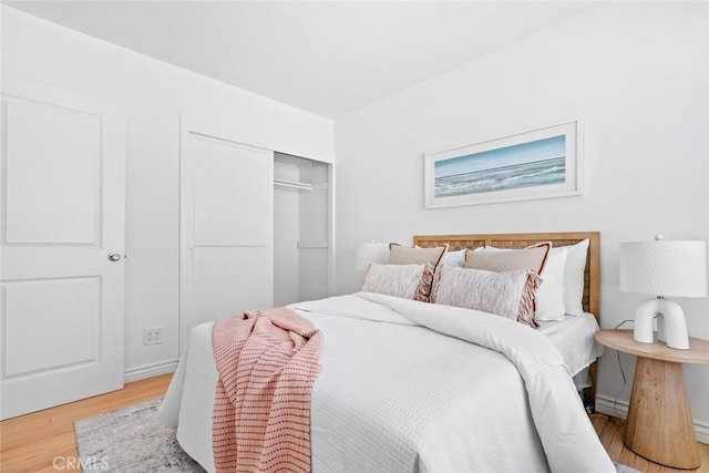 6454 Baird Ave, Reseda, CA 91335 - bedroom featuring light wood-type flooring and a closet