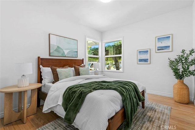 6454 Baird Ave, Reseda, CA 91335 - bedroom featuring light wood finished floors and baseboards