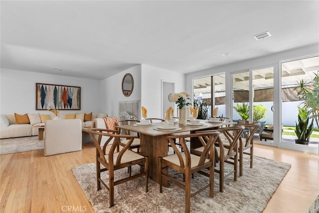6454 Baird Ave, Reseda, CA 91335 - dining space with light wood-style floors