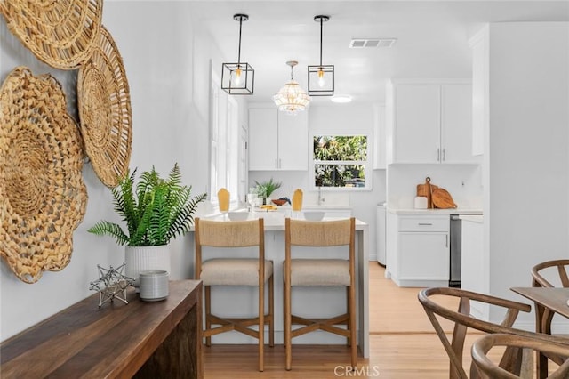 6454 Baird Ave, Reseda, CA 91335 - dining room featuring light wood-style floors