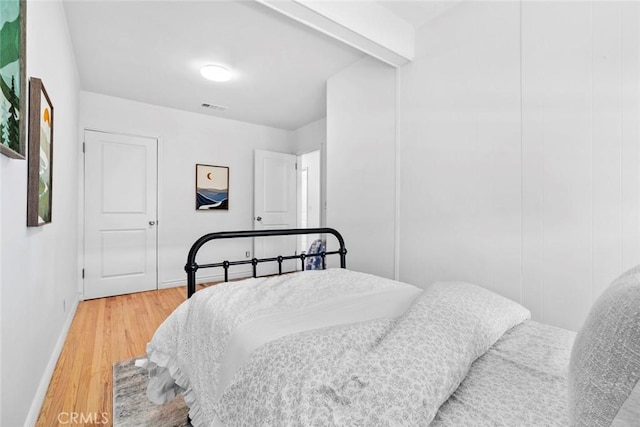 6454 Baird Ave, Reseda, CA 91335 - bedroom with baseboards and wood finished floors