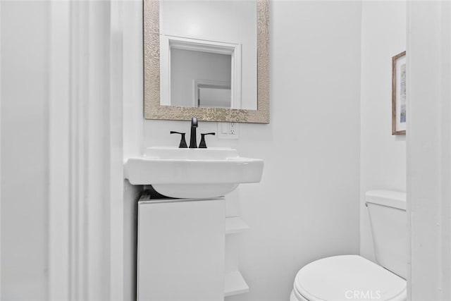 6454 Baird Ave, Reseda, CA 91335 - half bathroom featuring toilet and a sink