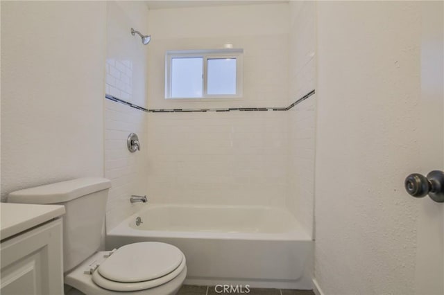 343 E 98th St, Los Angeles, CA 90003 - bathroom featuring toilet, a textured wall, shower / bath combination, and vanity