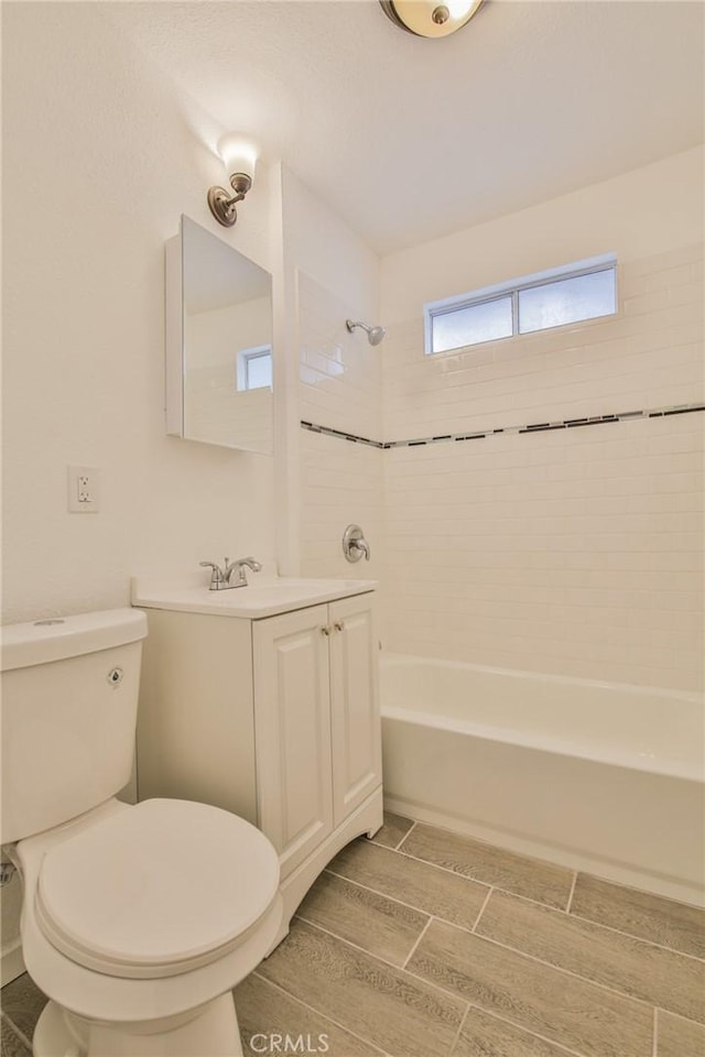 343 E 98th St, Los Angeles, CA 90003 - full bath with toilet, tub / shower combination, vanity, and wood finish floors