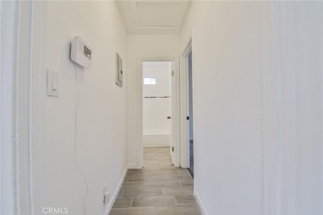 343 E 98th St, Los Angeles, CA 90003 - hallway with baseboards and wood finished floors