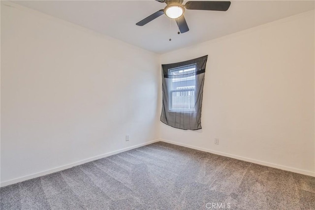 343 E 98th St, Los Angeles, CA 90003 - unfurnished room featuring carpet flooring, baseboards, and ceiling fan