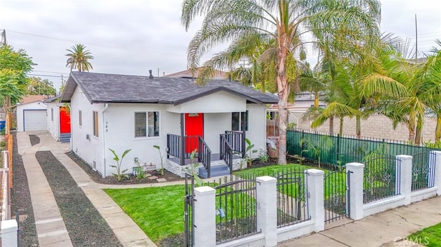 343 E 98th St, Los Angeles, CA 90003 - bungalow-style home with stucco siding, a shingled roof, a gate, a detached garage, and driveway