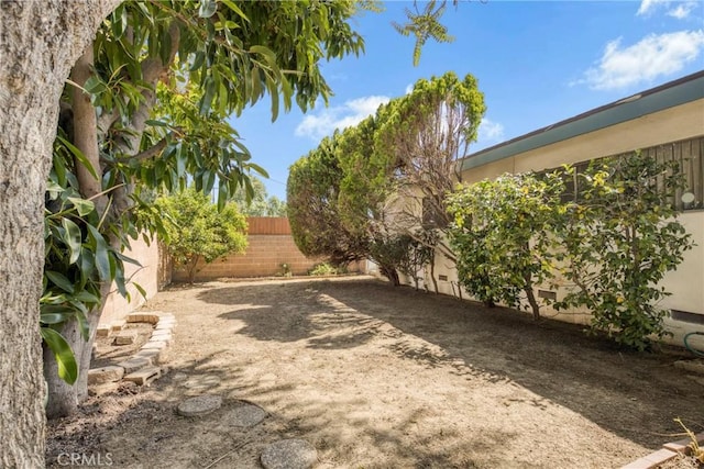 view of yard featuring fence