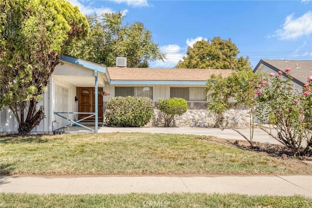 ranch-style house with a front yard