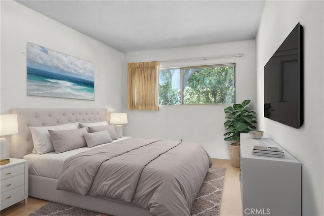 bedroom with light wood-style flooring
