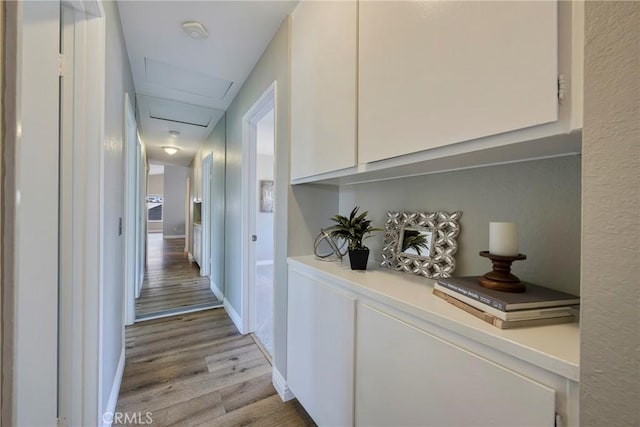 hall featuring light wood-type flooring