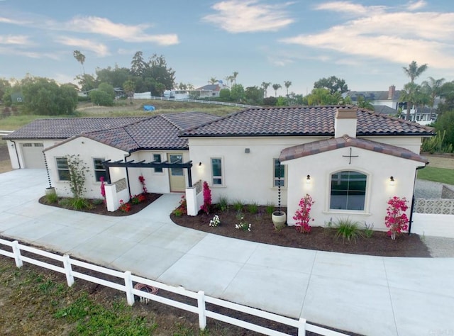 239 Futurity Ln, Fallbrook, CA 92028 - mediterranean / spanish-style home featuring a tiled roof, driveway, stucco siding, a chimney, and an attached garage