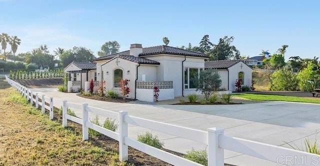 239 Futurity Ln, Fallbrook, CA 92028 - mediterranean / spanish house with a chimney and a tile roof